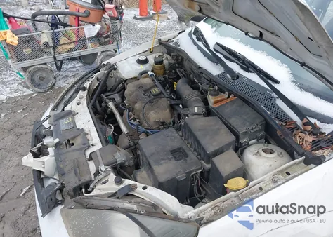 2004 Ford Focus Lx z USA, uszkodzony, nr VIN 1FAFP33P44W195187